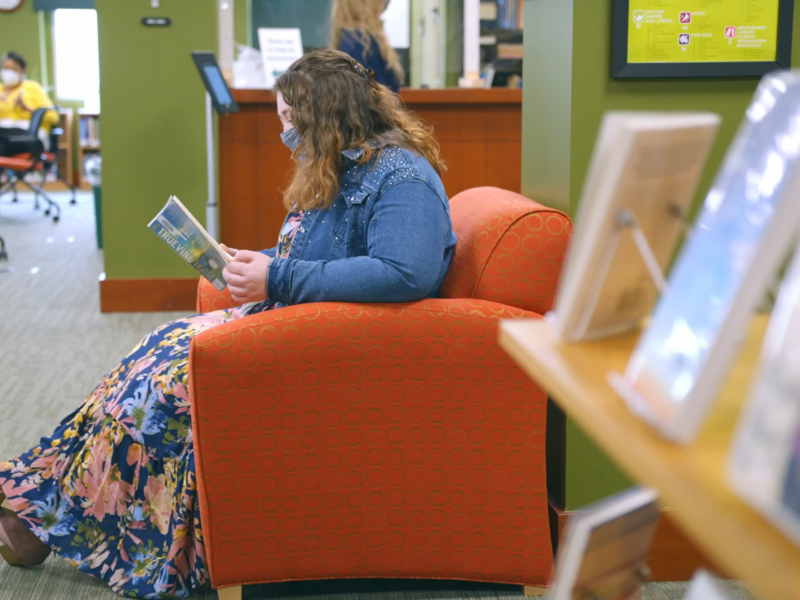 A student reading in the library